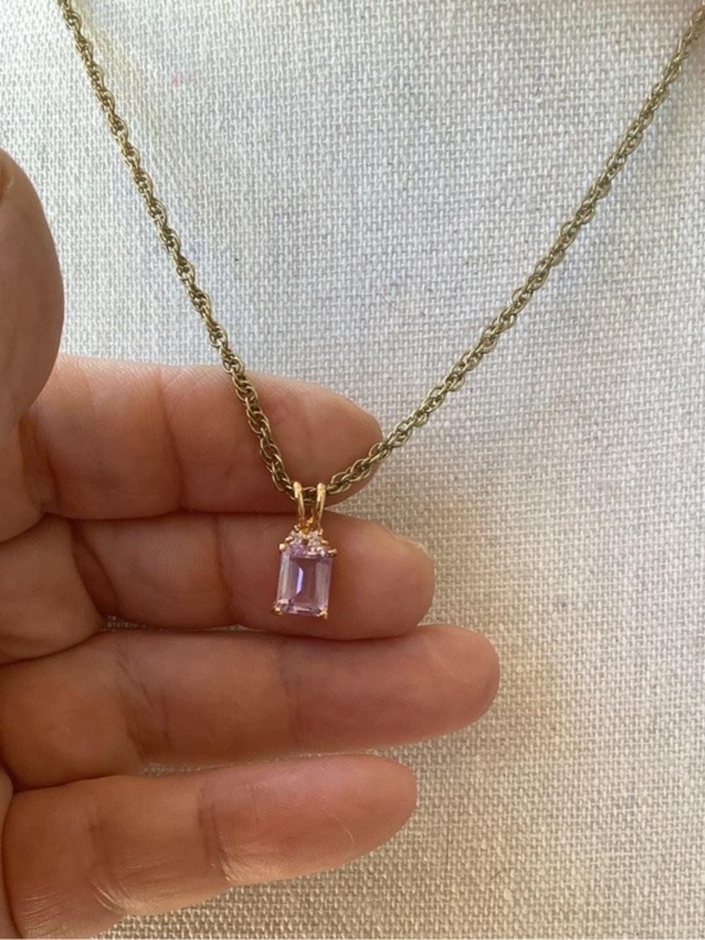 Gold tone Necklace with purple cubic zirconia Pendant